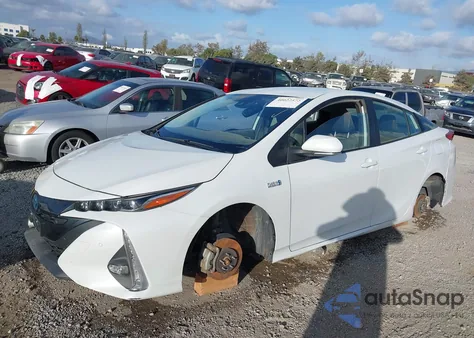 2021 Toyota Prius Prime Limited from USA, damaged, VIN JTDKAMFP7M3190949